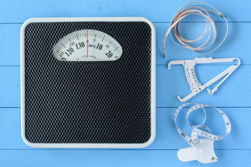 Body mass index: tools like scales and calipers used to evaluate body composition.